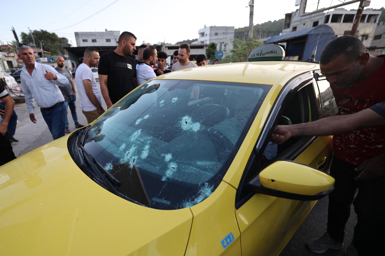 Israel west bank checkpoint shooting