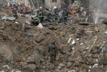 Landslide survivors toll continues reaches reuters debris among